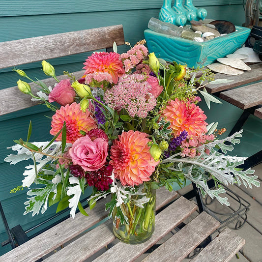 bright seasonal flowers in vase for all occasions